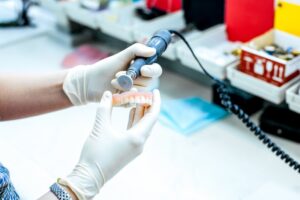 a dental laboratory technician creating a denture