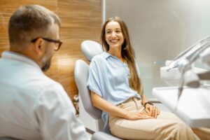 a patient consulting with a cosmetic dentist